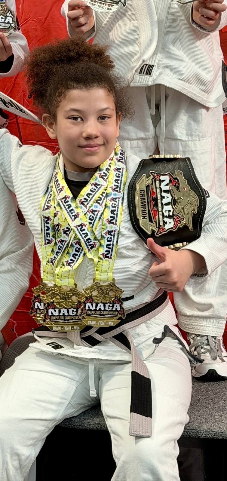 Dreimal Gold und der Champion-Gürtel an der NAGA Paris, März 2026.